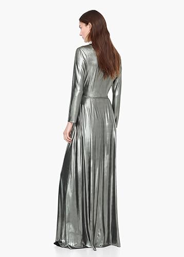 Woman in long silver dress in back