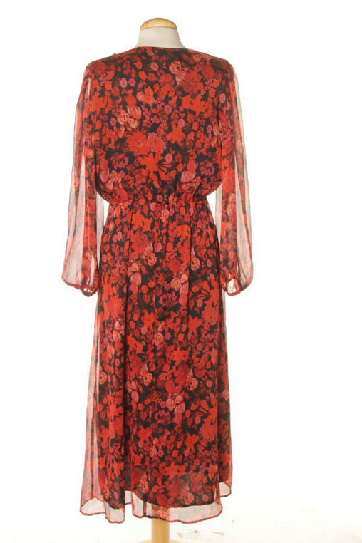 Red floral dress on a mannequin against a white background