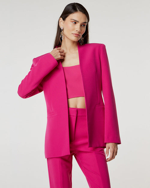 woman in pink suit