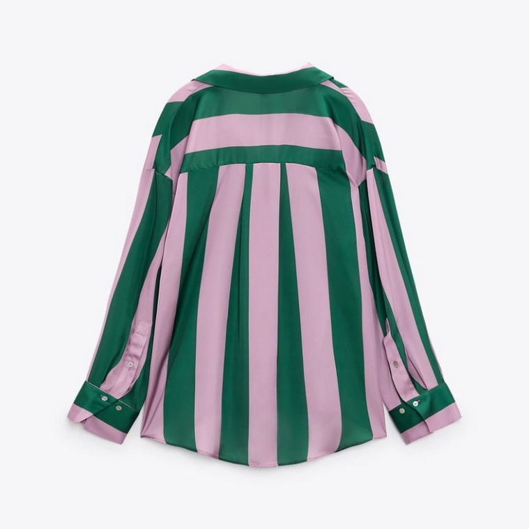 Green and pink striped shirt on a white background