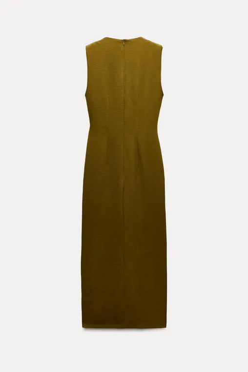 Long mustard yellow dress on a white background