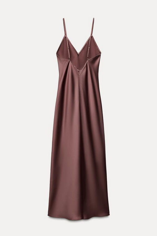 Brown satin slip dress on a light gray background
